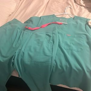 FIGS scrubs in surgical green